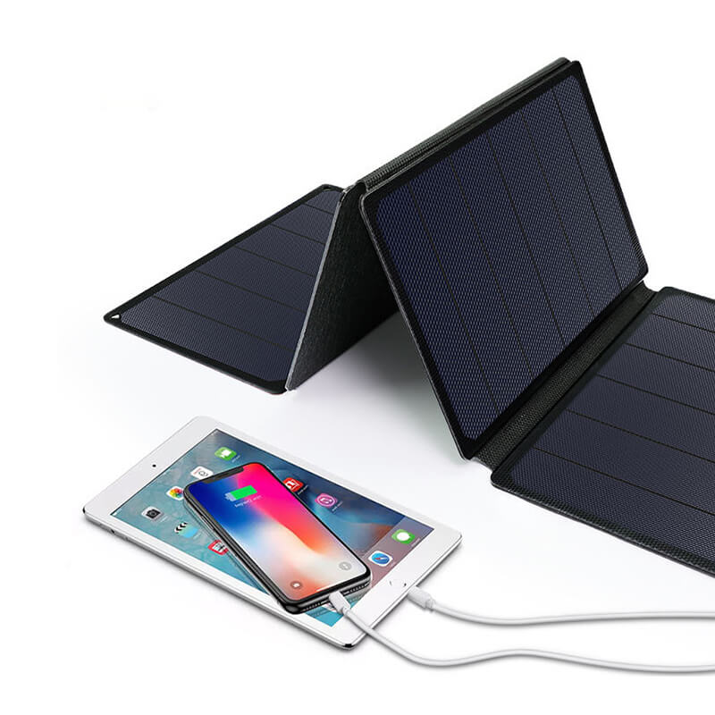 Folding solar panels are charging the phone